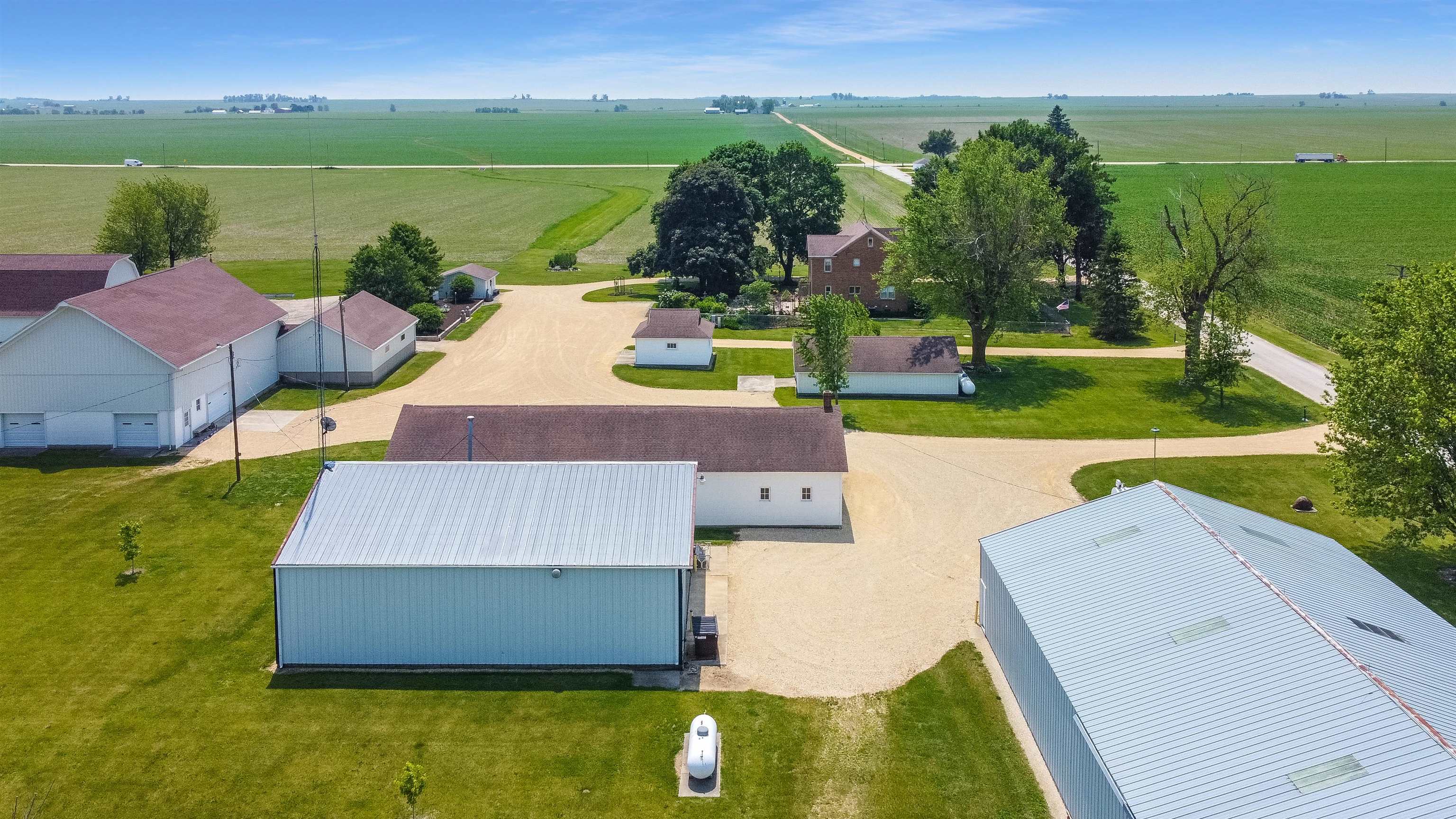 10225 North Brookville Road Shannon, IL 61078 - Photo 54 of 65 an aerial view of a house with garden space and outdoor seating