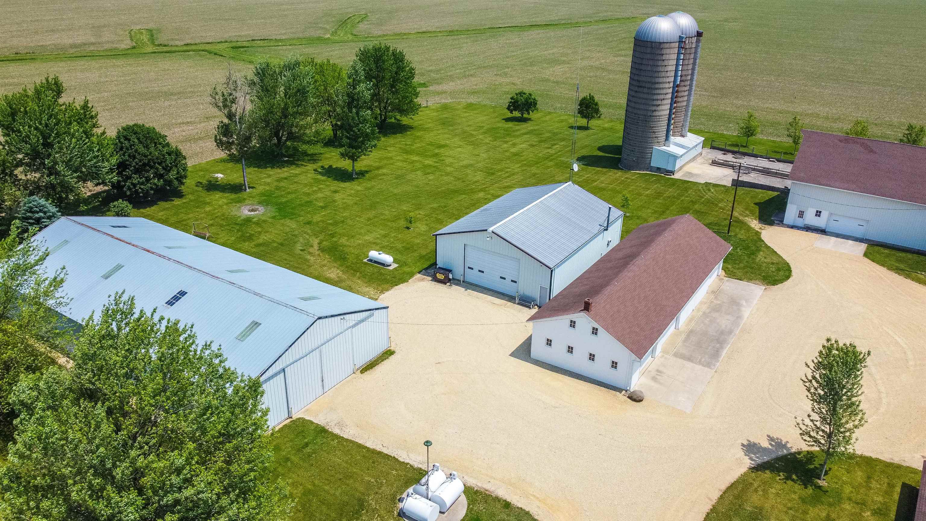 10225 North Brookville Road Shannon, IL 61078 - Photo 55 of 65 a view of a swimming pool with a yard