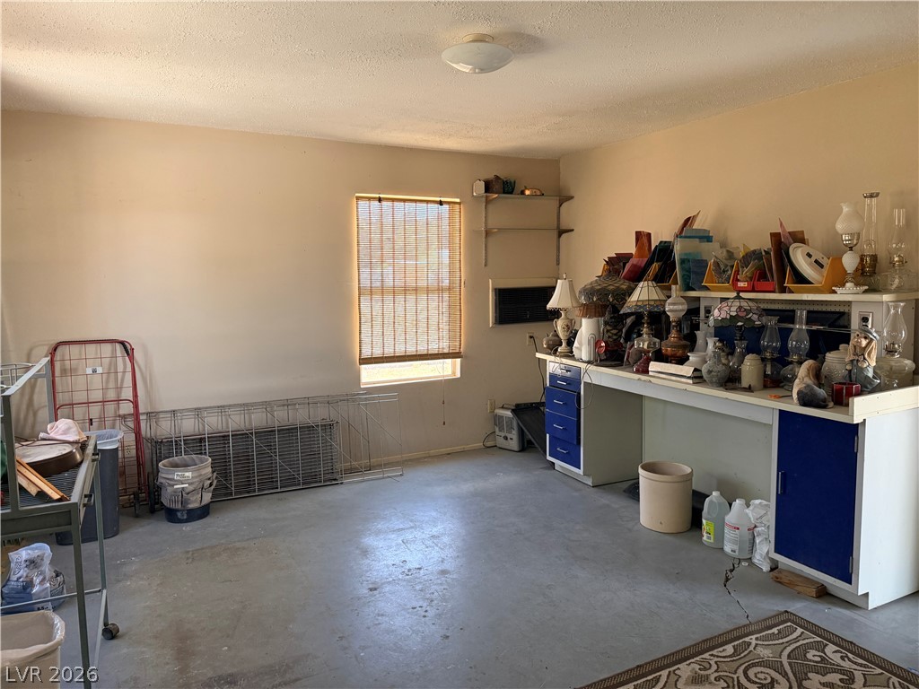 1391 West Dyer Road Pahrump, NV 89048 - Photo 32 of 50 A versatile space awaits customization, offering potential for various uses.