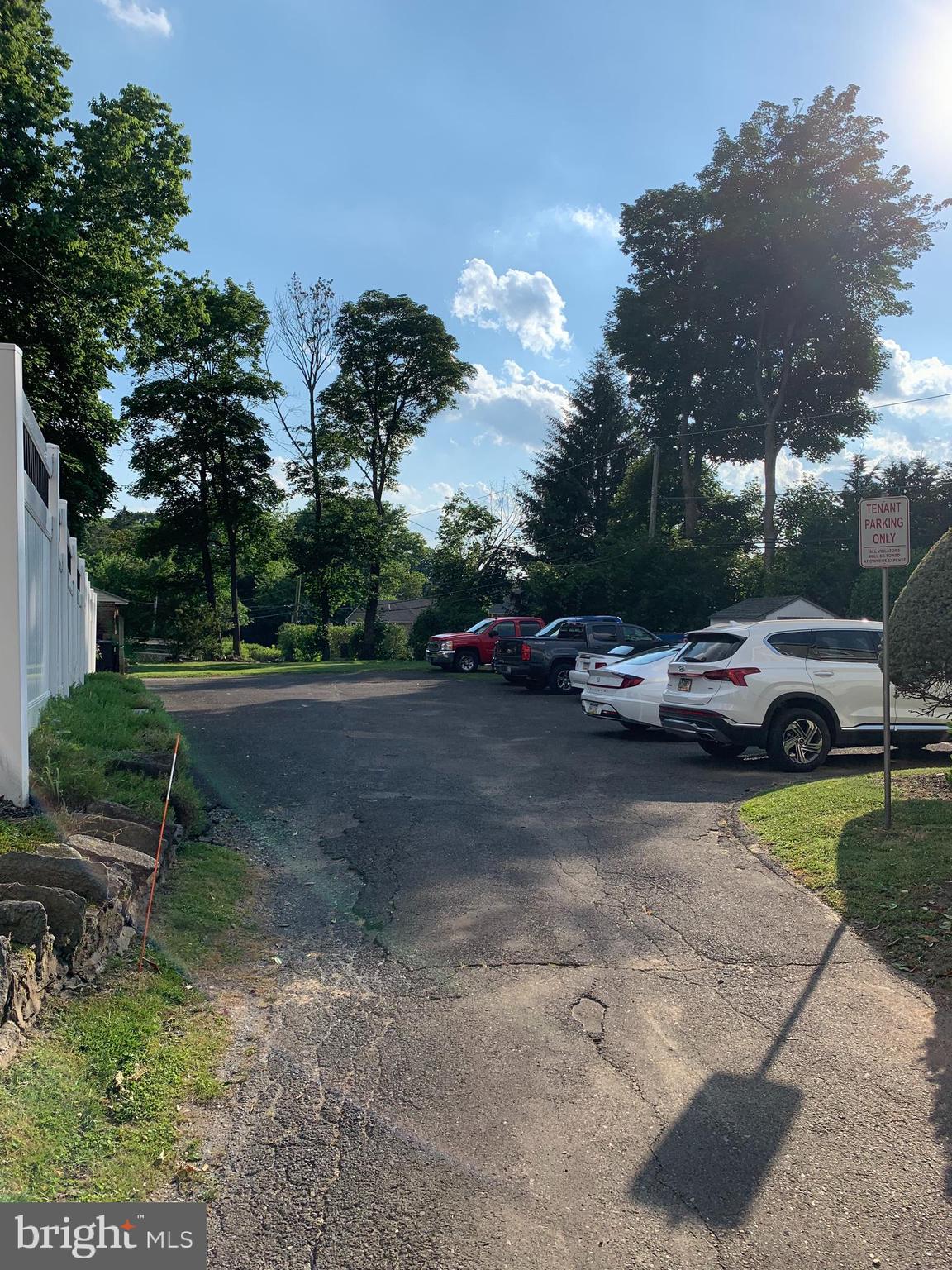 517 Walnut Street, Unit 3 Jenkintown, PA 19046 - Photo 16 of 16 a view of a yard with cars parked