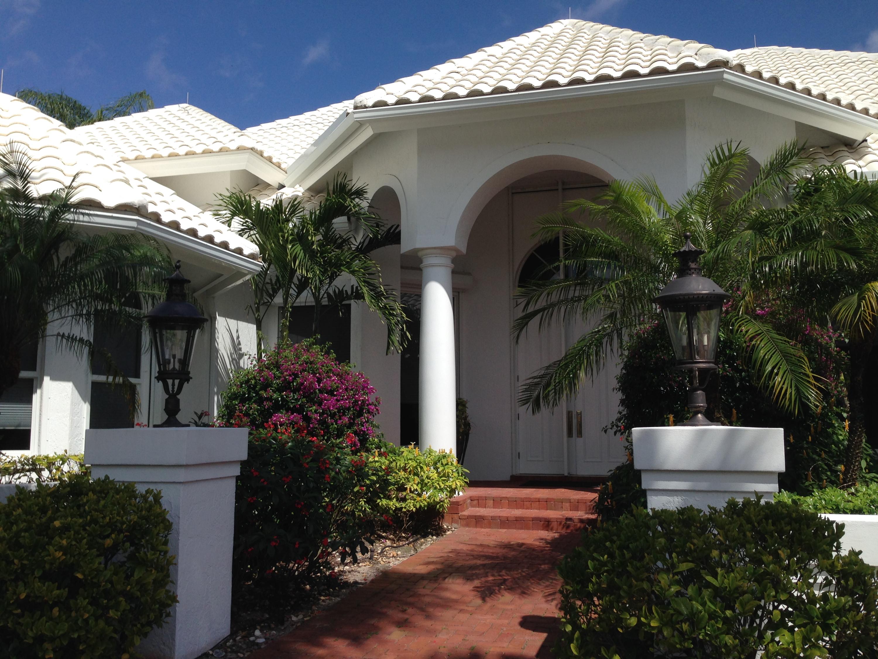 7219 Queenferry Circle Boca Raton, FL 33496 - Photo 1 of 3 Gorgeous Exterior With Lusch Foliage