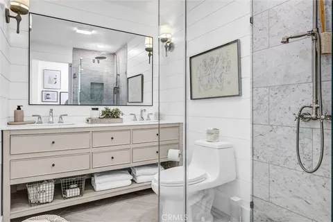 a bathroom with a bathtub and a sink