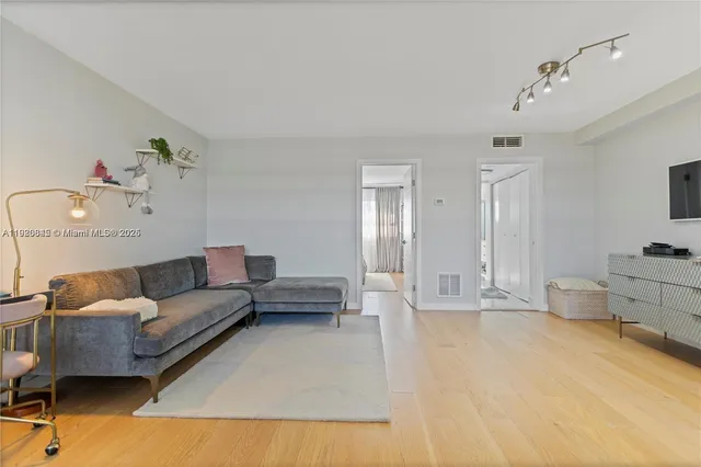 a living room with furniture and a couch