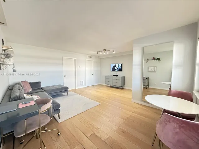 a bedroom with a bed and furniture