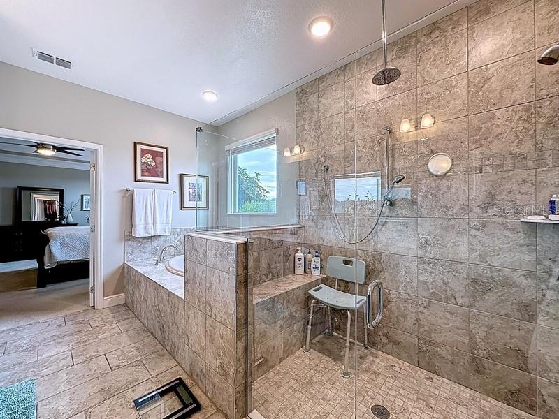 10148 Florence Ridge Drive Clermont, FL 34711 - Photo 24 of 47 a living room with furniture and a wooden floor