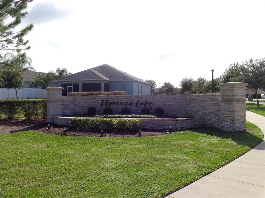 10148 Florence Ridge Drive Clermont, FL 34711 - Photo 3 of 47 a view of a house with a garden