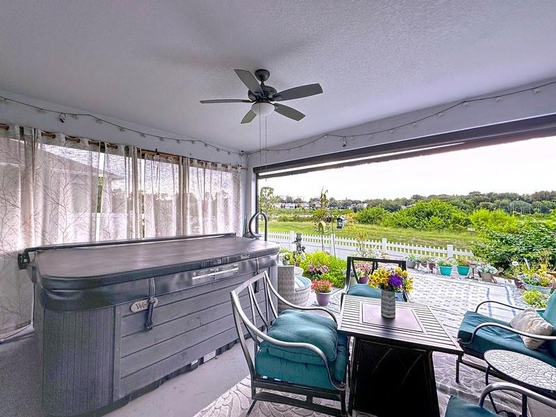 10148 Florence Ridge Drive Clermont, FL 34711 - Photo 38 of 47 a living room with furniture and a large window