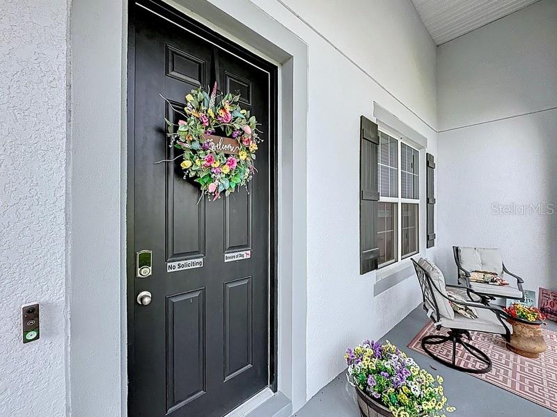 10148 Florence Ridge Drive Clermont, FL 34711 - Photo 4 of 47 a view of entryway with wooden floor