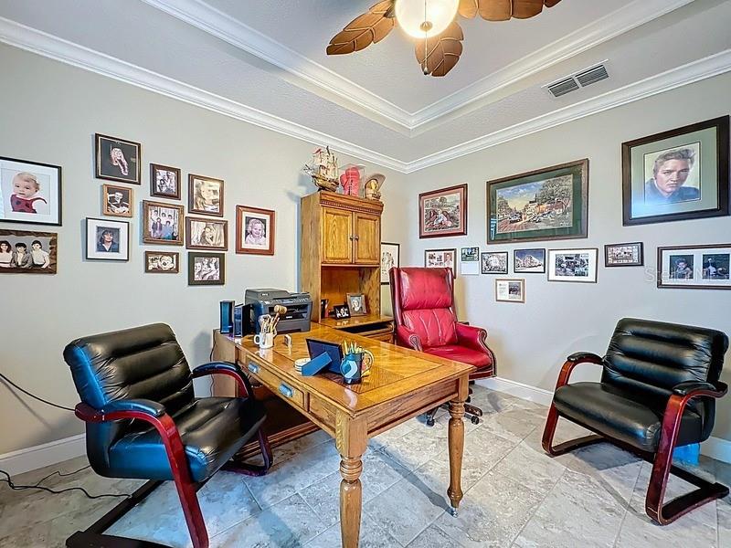 10148 Florence Ridge Drive Clermont, FL 34711 - Photo 9 of 47 a living room with furniture a rug and a window