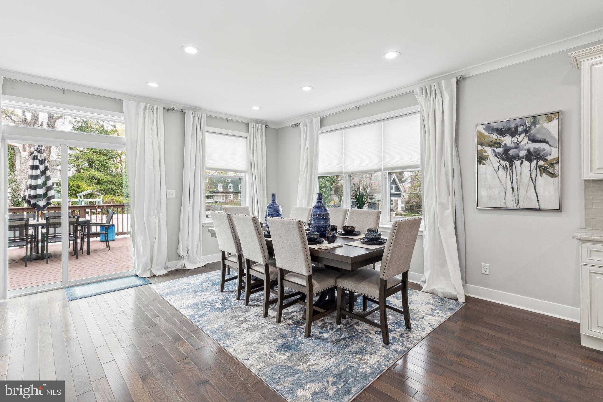 5301 Gainor Road Philadelphia, PA 19131 - Photo 11 of 51 a view of a dining room with furniture window and wooden floor