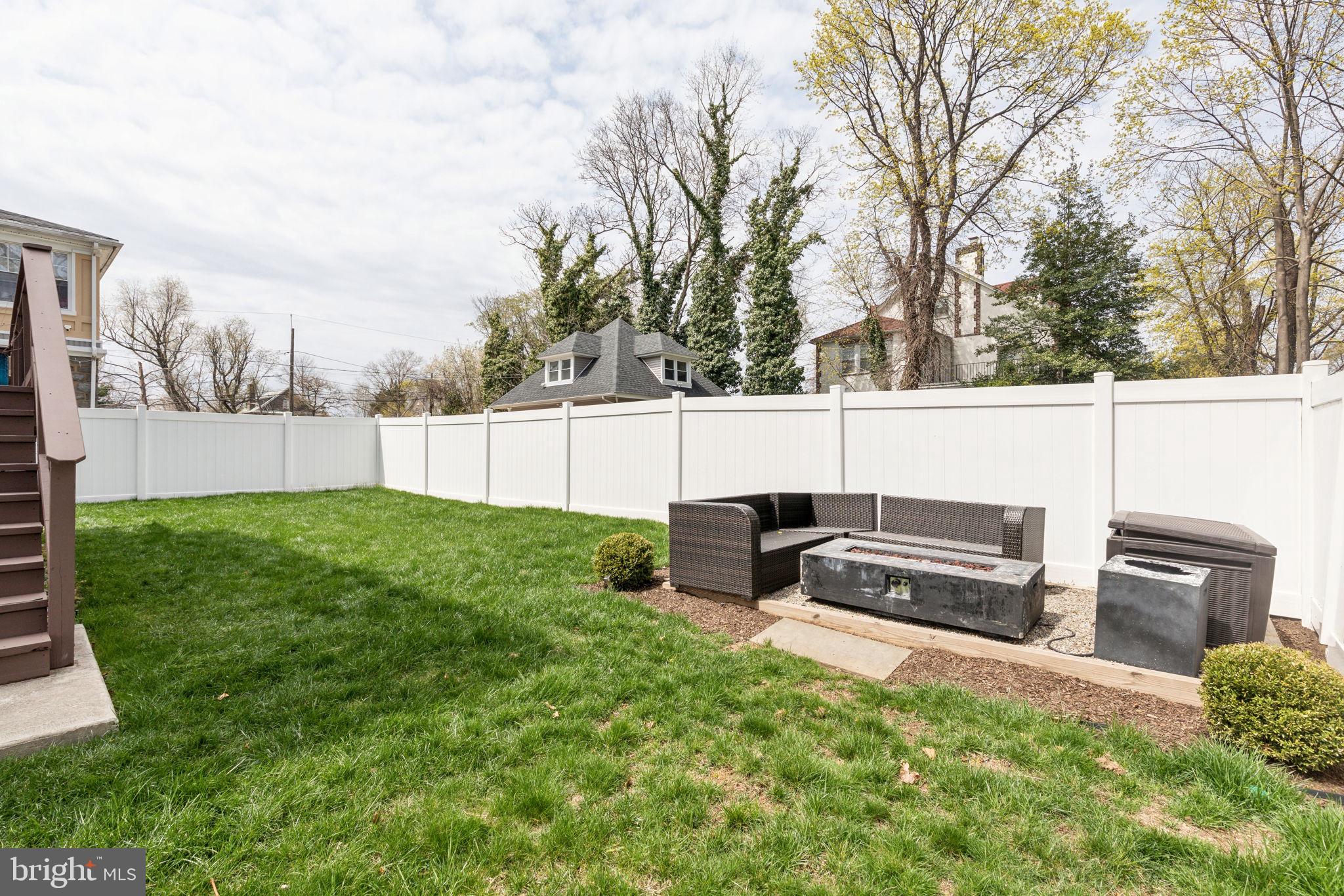 5301 Gainor Road Philadelphia, PA 19131 - Photo 17 of 51 a view of a backyard with sitting area