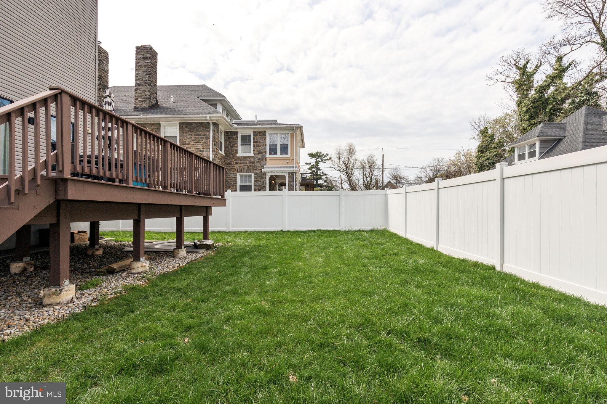 5301 Gainor Road Philadelphia, PA 19131 - Photo 18 of 51 a view of a house with a yard and sitting area