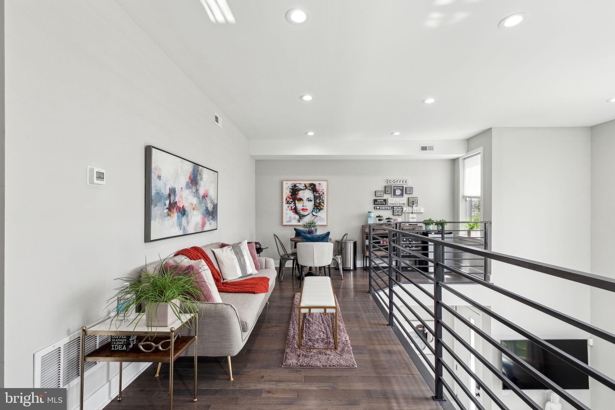 5301 Gainor Road Philadelphia, PA 19131 - Photo 19 of 51 a living room with furniture and wooden floor