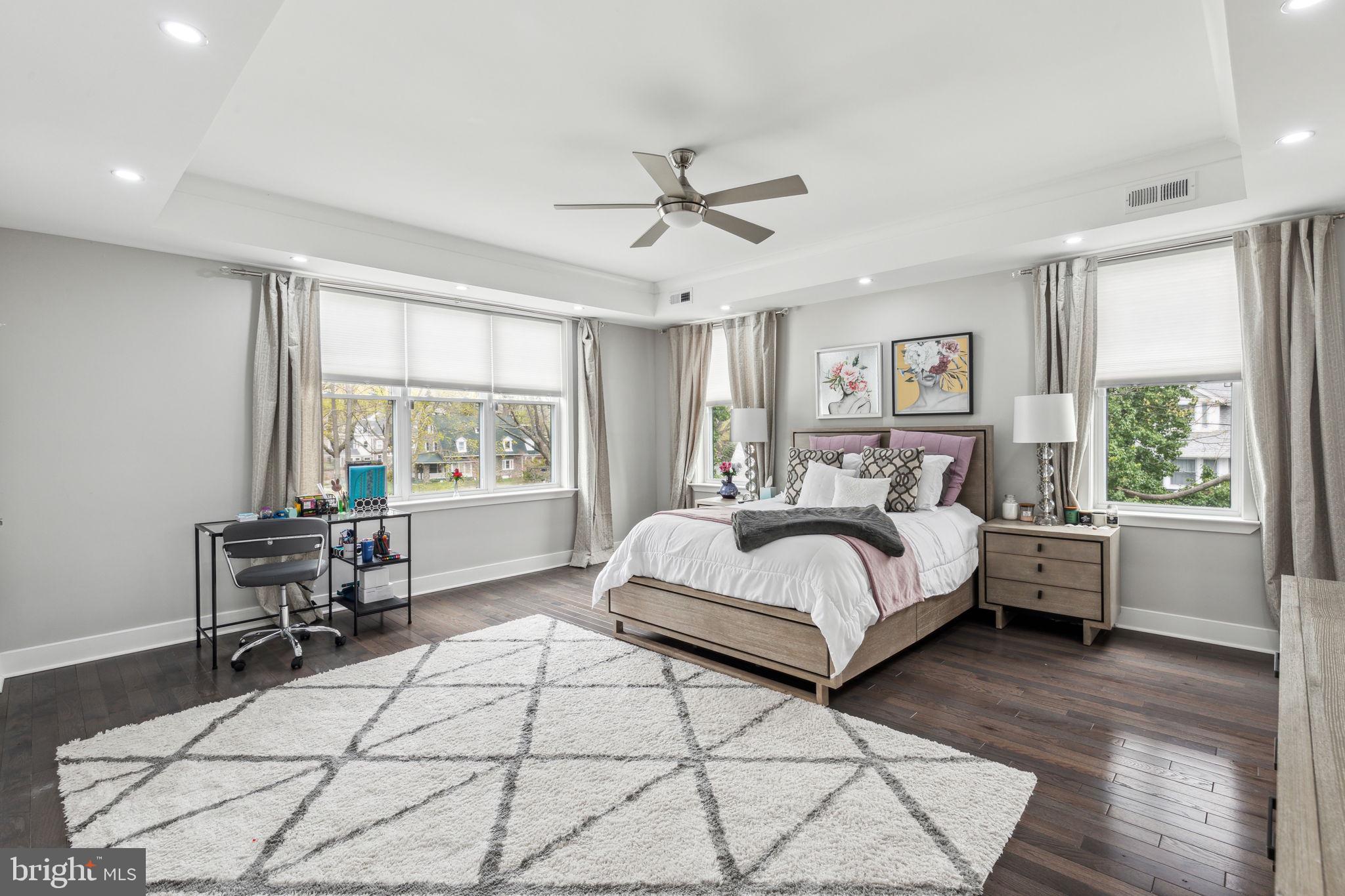 5301 Gainor Road Philadelphia, PA 19131 - Photo 22 of 51 a bedroom with a large bed and large window