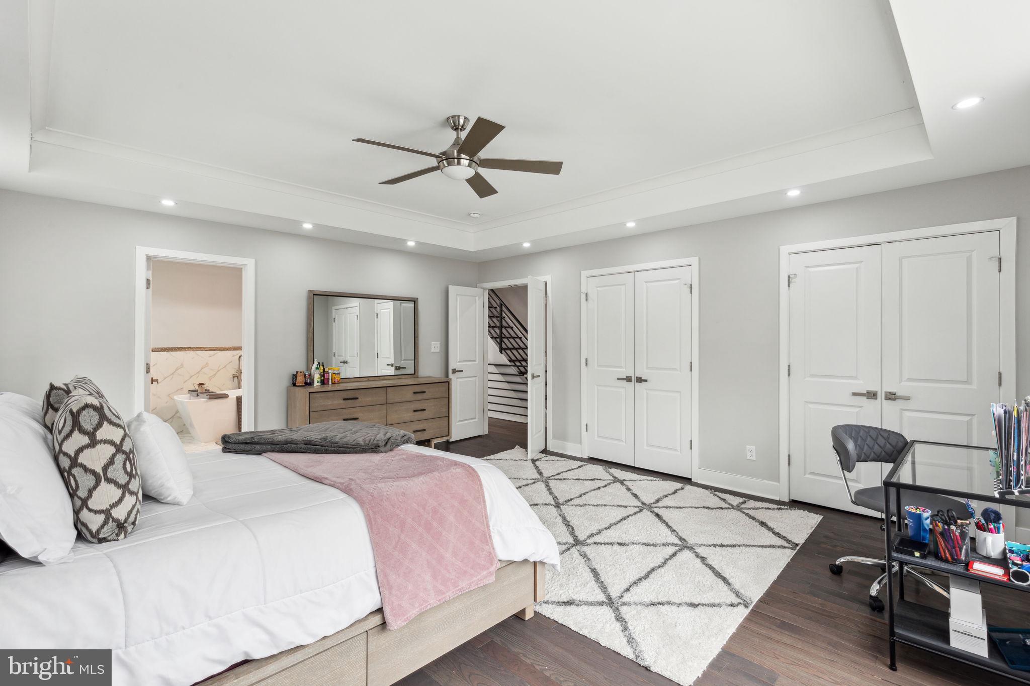 5301 Gainor Road Philadelphia, PA 19131 - Photo 24 of 51 a spacious bedroom with a bed and a table in it