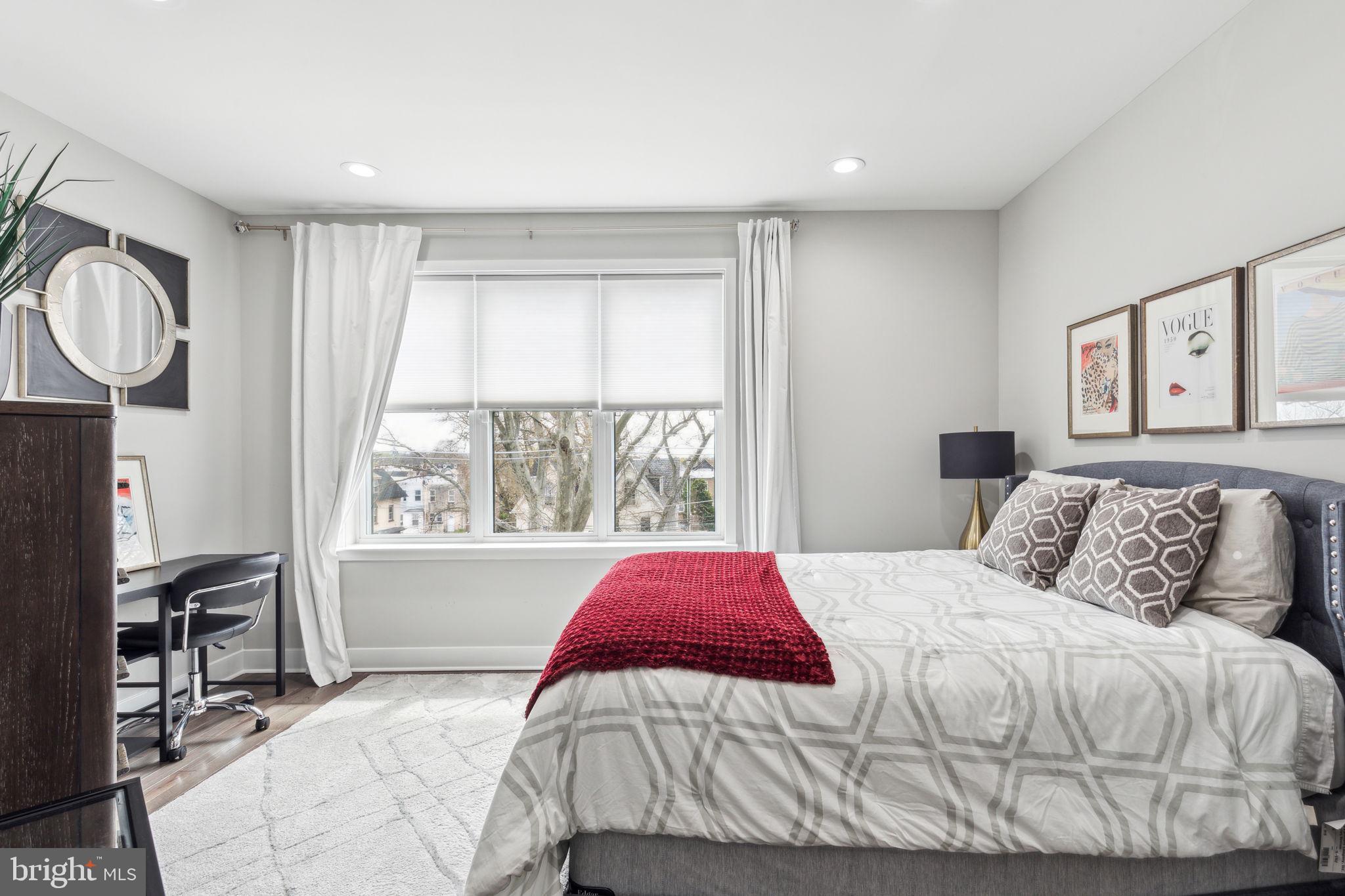 5301 Gainor Road Philadelphia, PA 19131 - Photo 29 of 51 a bedroom with a bed and a window
