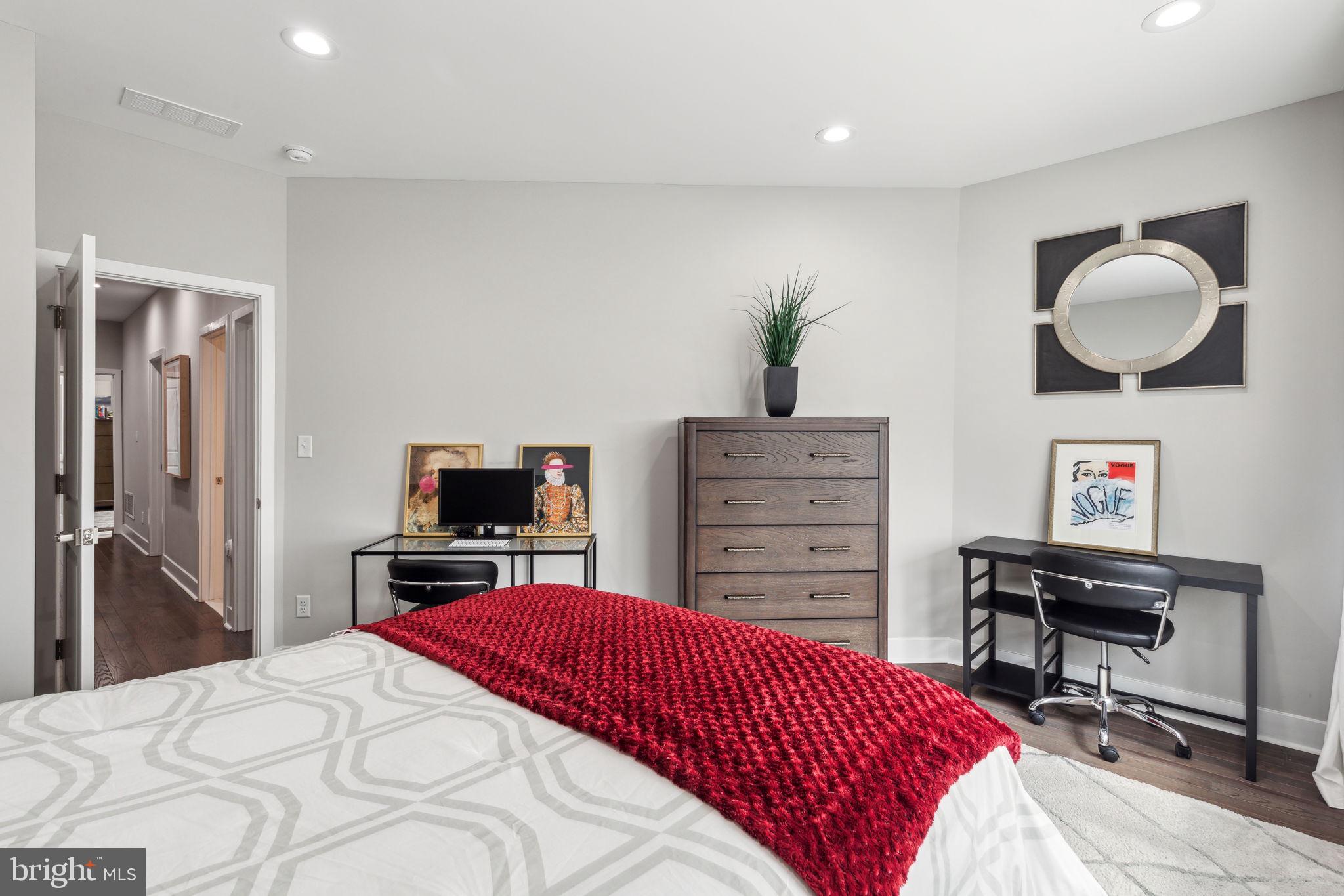 5301 Gainor Road Philadelphia, PA 19131 - Photo 30 of 51 a bedroom with a bed and furniture