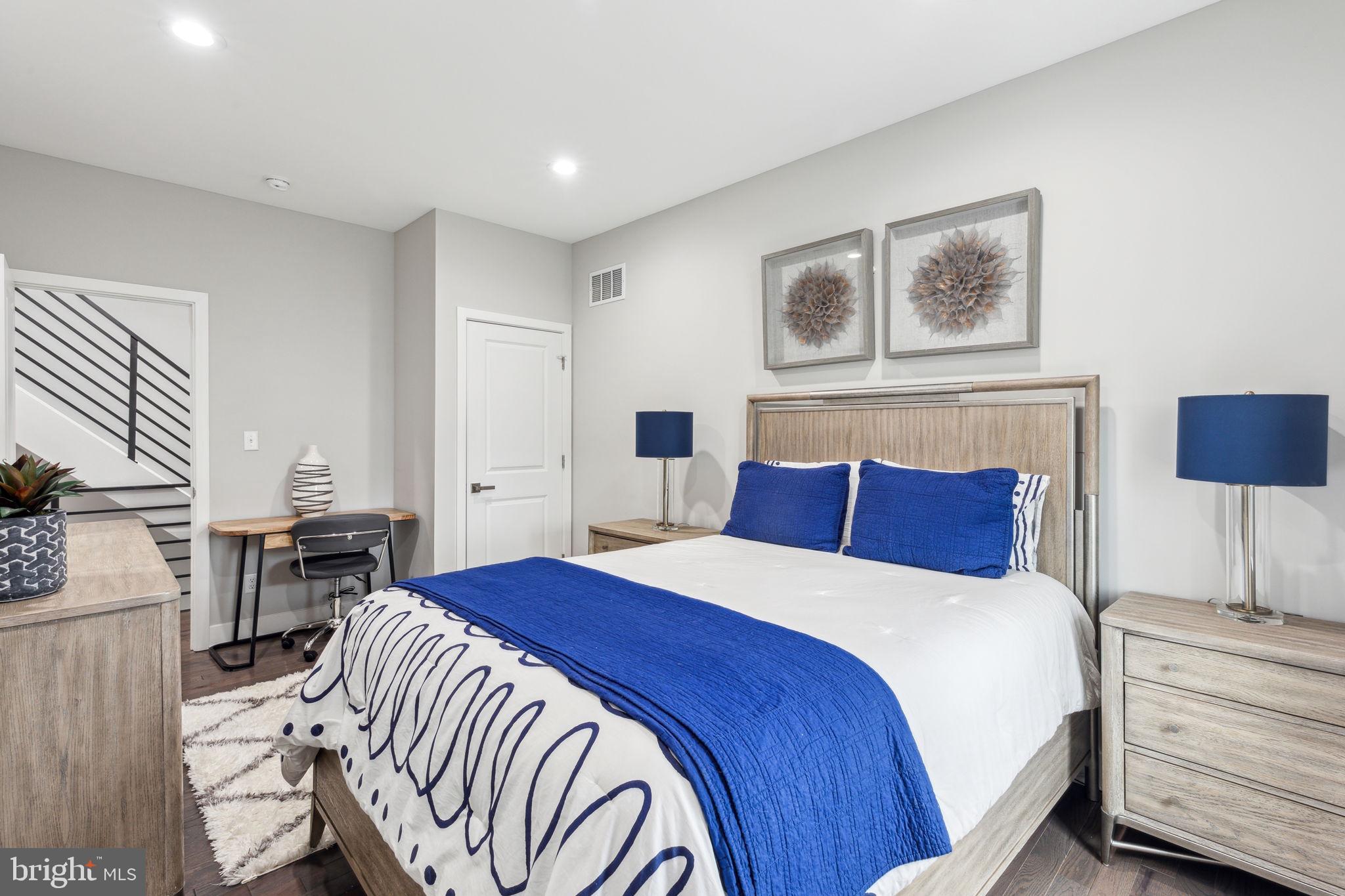 5301 Gainor Road Philadelphia, PA 19131 - Photo 35 of 51 a bed room with a bed and a chair