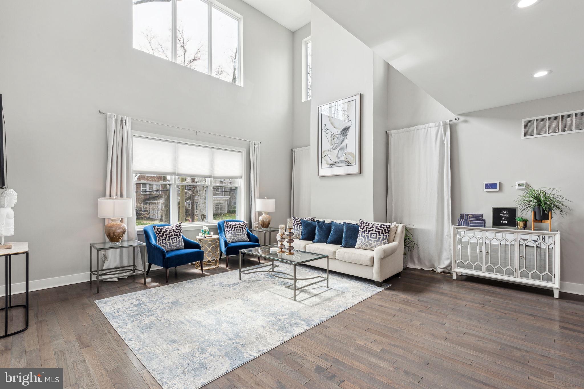5301 Gainor Road Philadelphia, PA 19131 - Photo 4 of 51 a living room with furniture and wooden floor