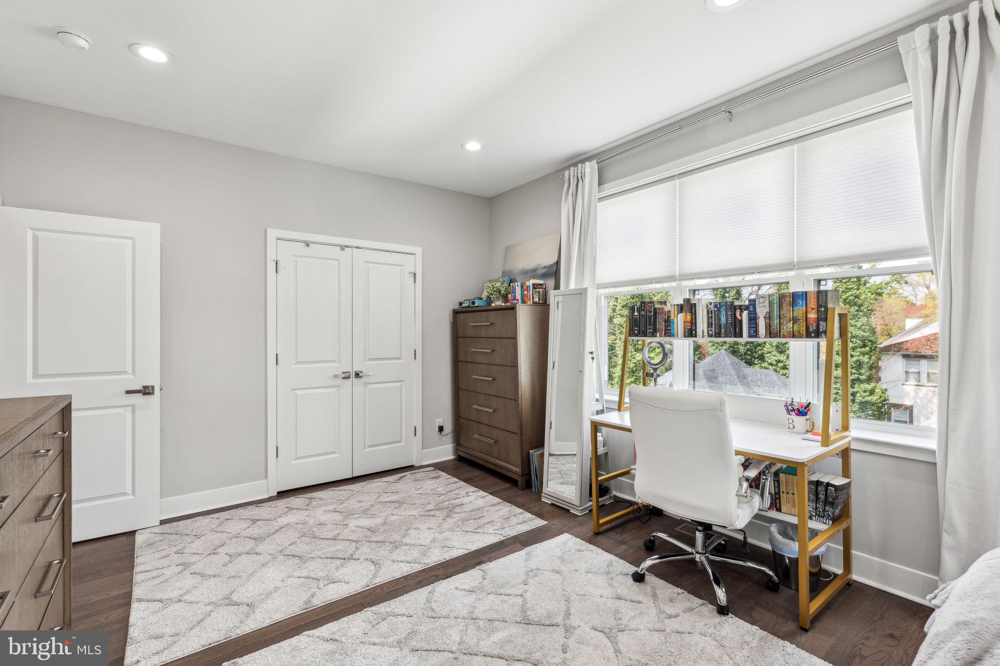 5301 Gainor Road Philadelphia, PA 19131 - Photo 41 of 51 a view of a workspace with furniture and a window