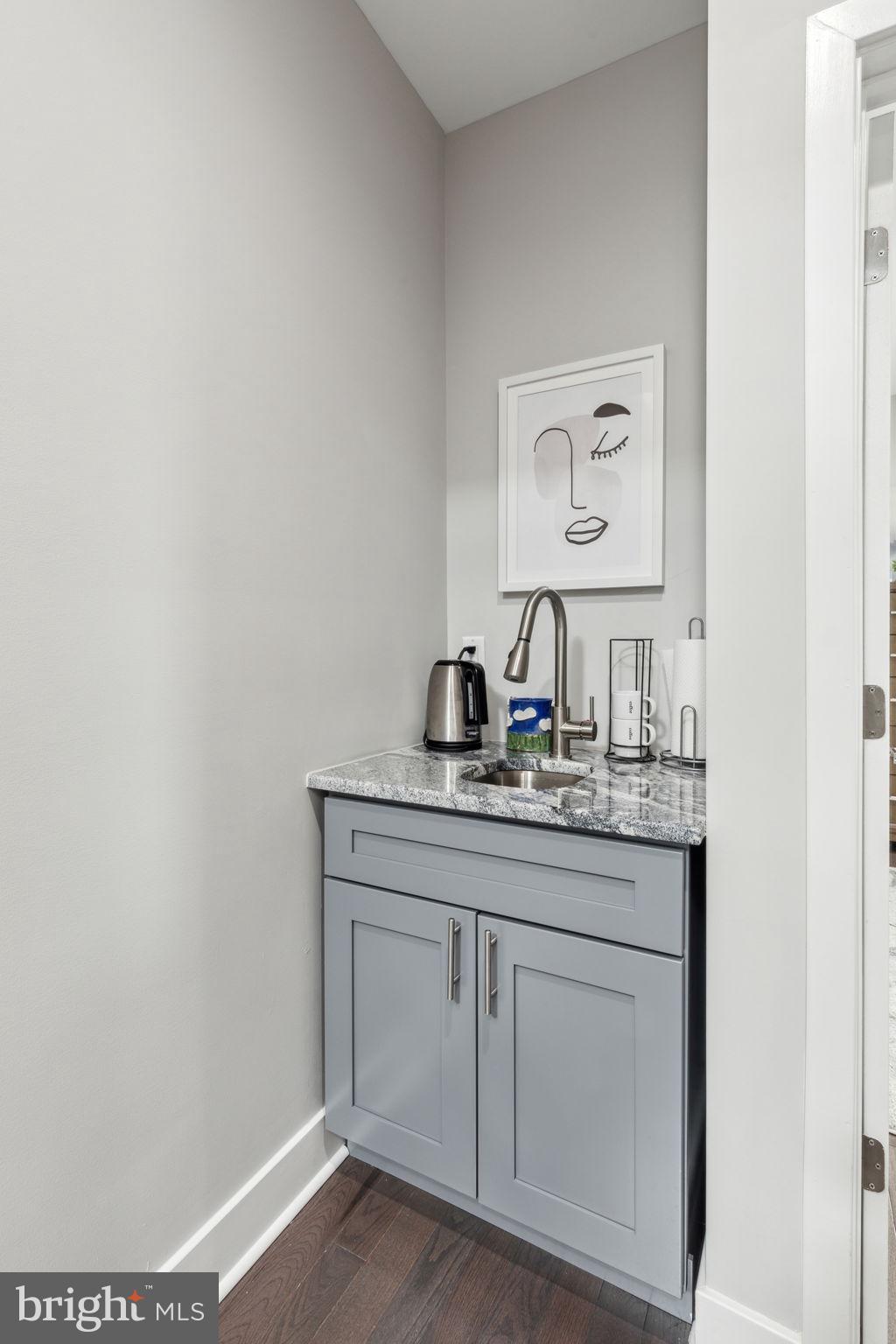 5301 Gainor Road Philadelphia, PA 19131 - Photo 42 of 51 a room with a sink and a mirror