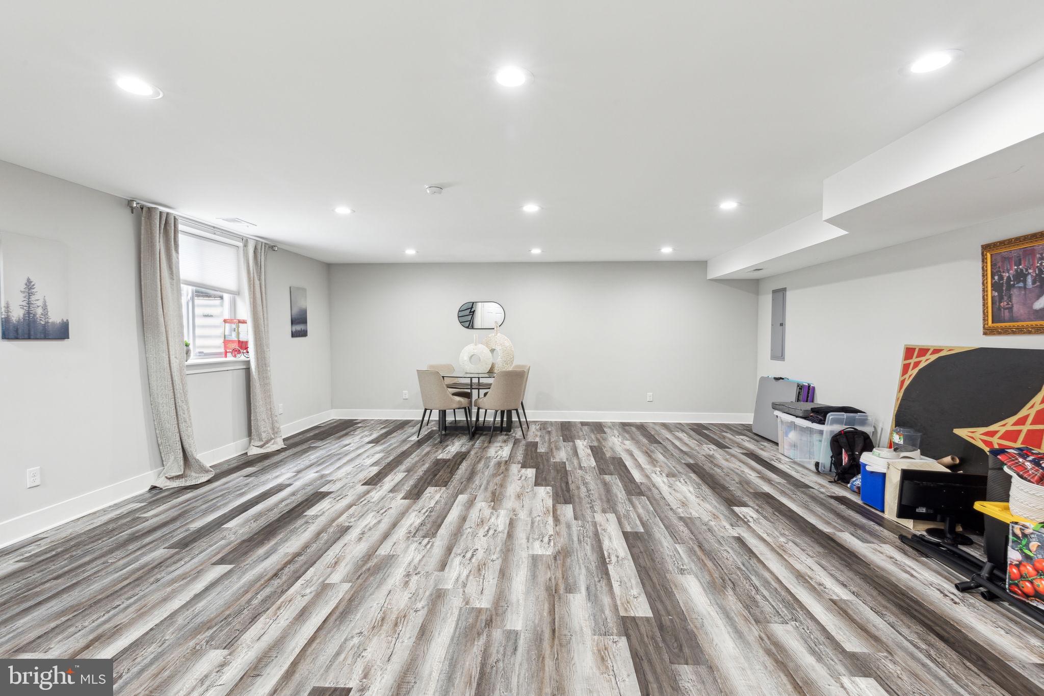 5301 Gainor Road Philadelphia, PA 19131 - Photo 45 of 51 a view of a room with wooden floor