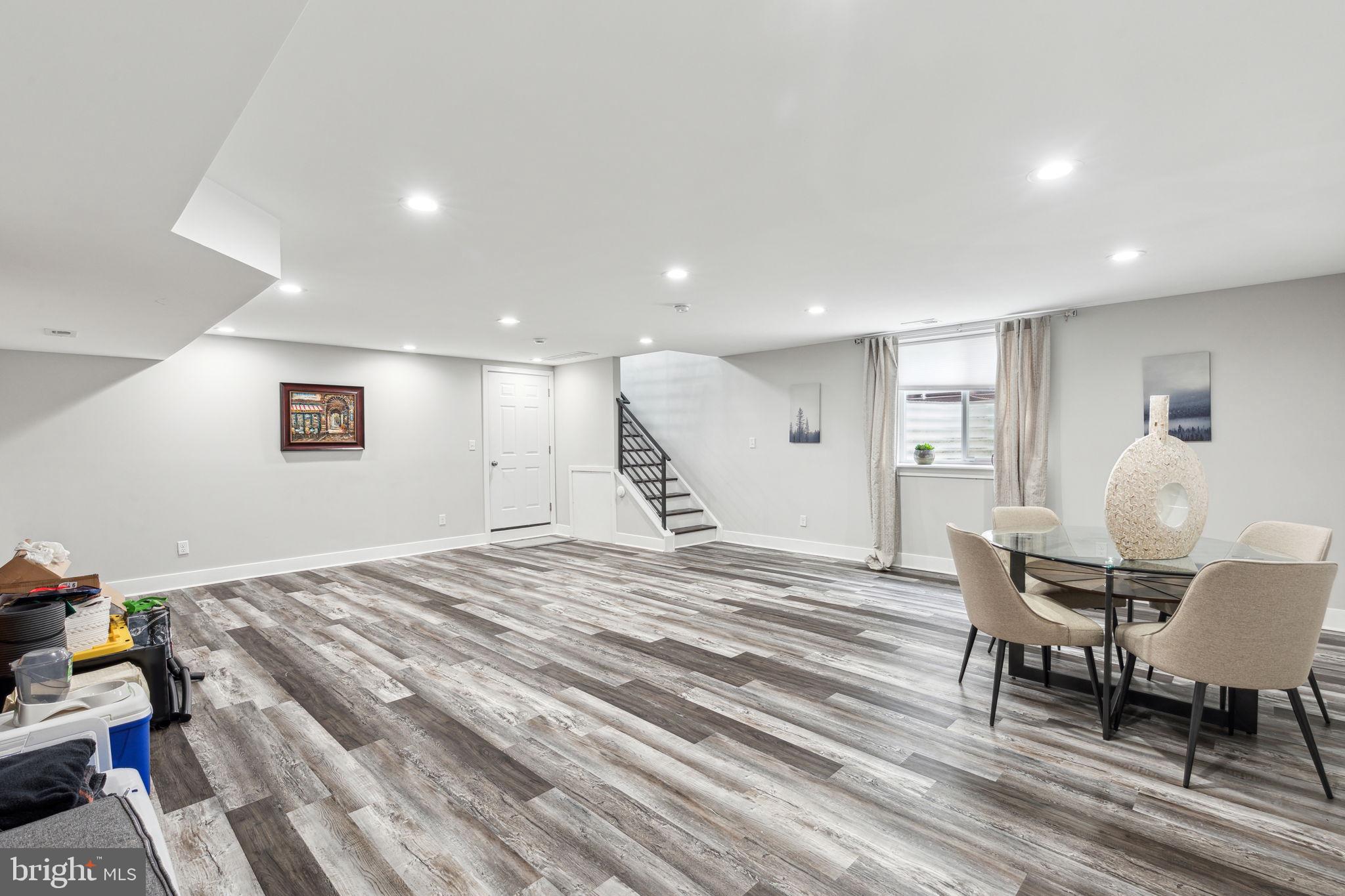 5301 Gainor Road Philadelphia, PA 19131 - Photo 46 of 51 a view of a livingroom with furniture and a dining table