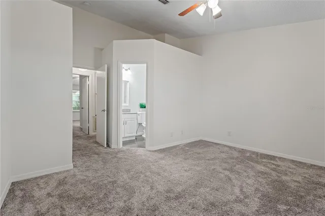 an empty room with a bathroom