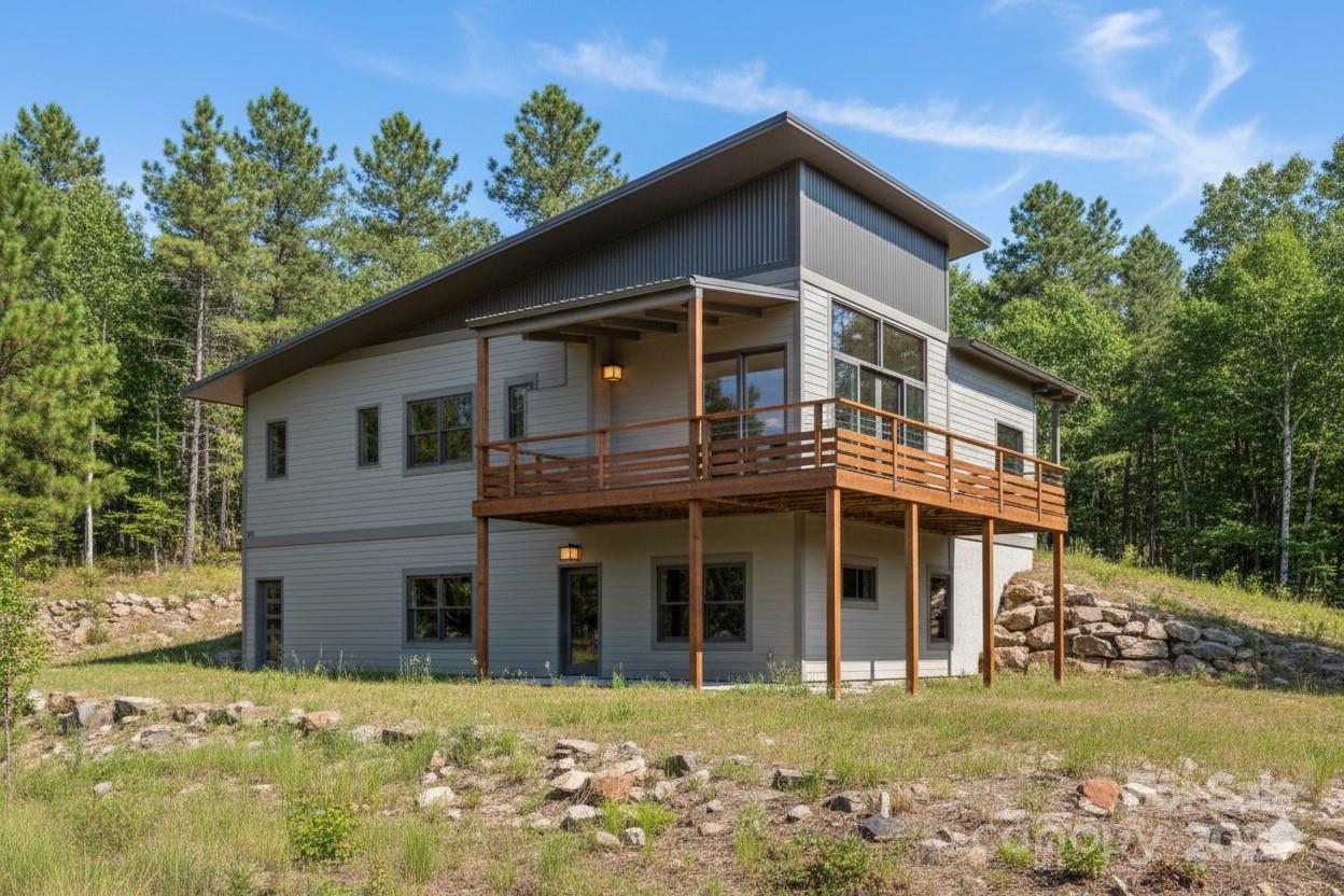 92 Senator Reynolds Road Asheville, NC 28804 - Photo 2 of 13 a front view of a house with a yard