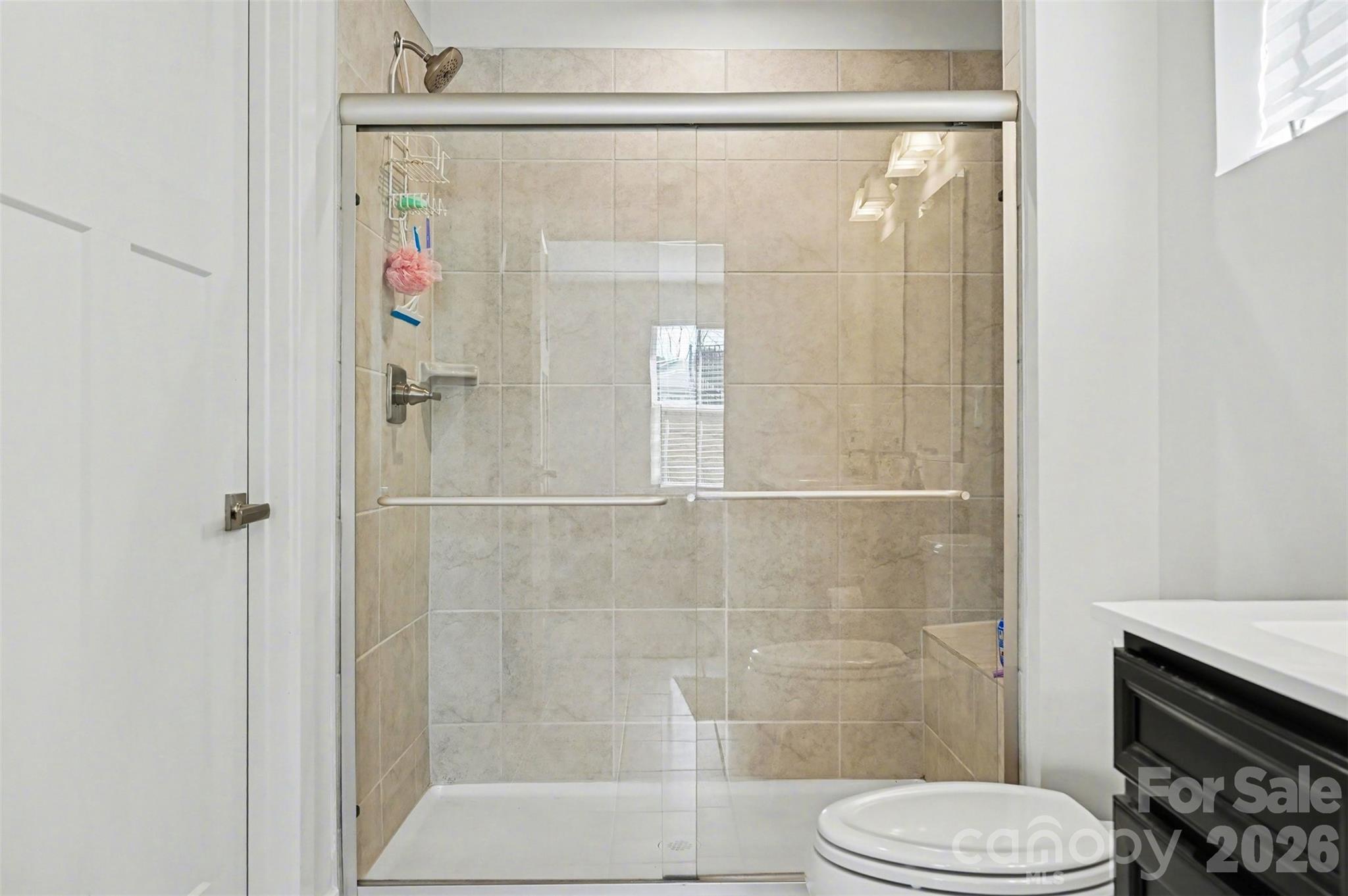 621 Grandiflora Avenue Lancaster, SC 29720 - Photo 22 of 37 a bathroom with a shower and a toilet