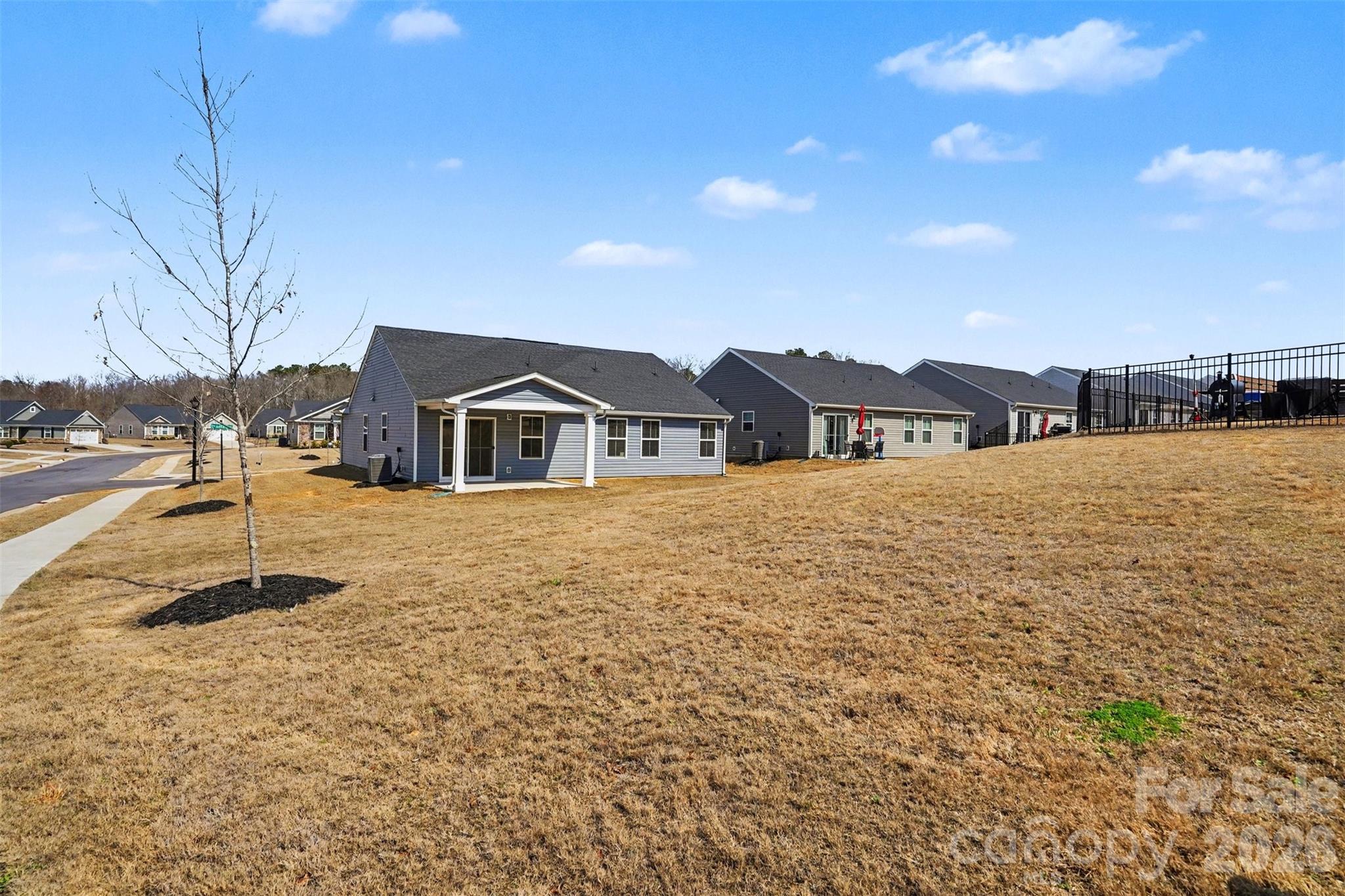 621 Grandiflora Avenue Lancaster, SC 29720 - Photo 33 of 37 a house view with a outdoor space