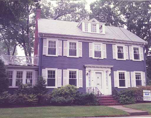 44 Russell Road Newton, MA 02465 - Photo 1 of 1 front view of house with a yard