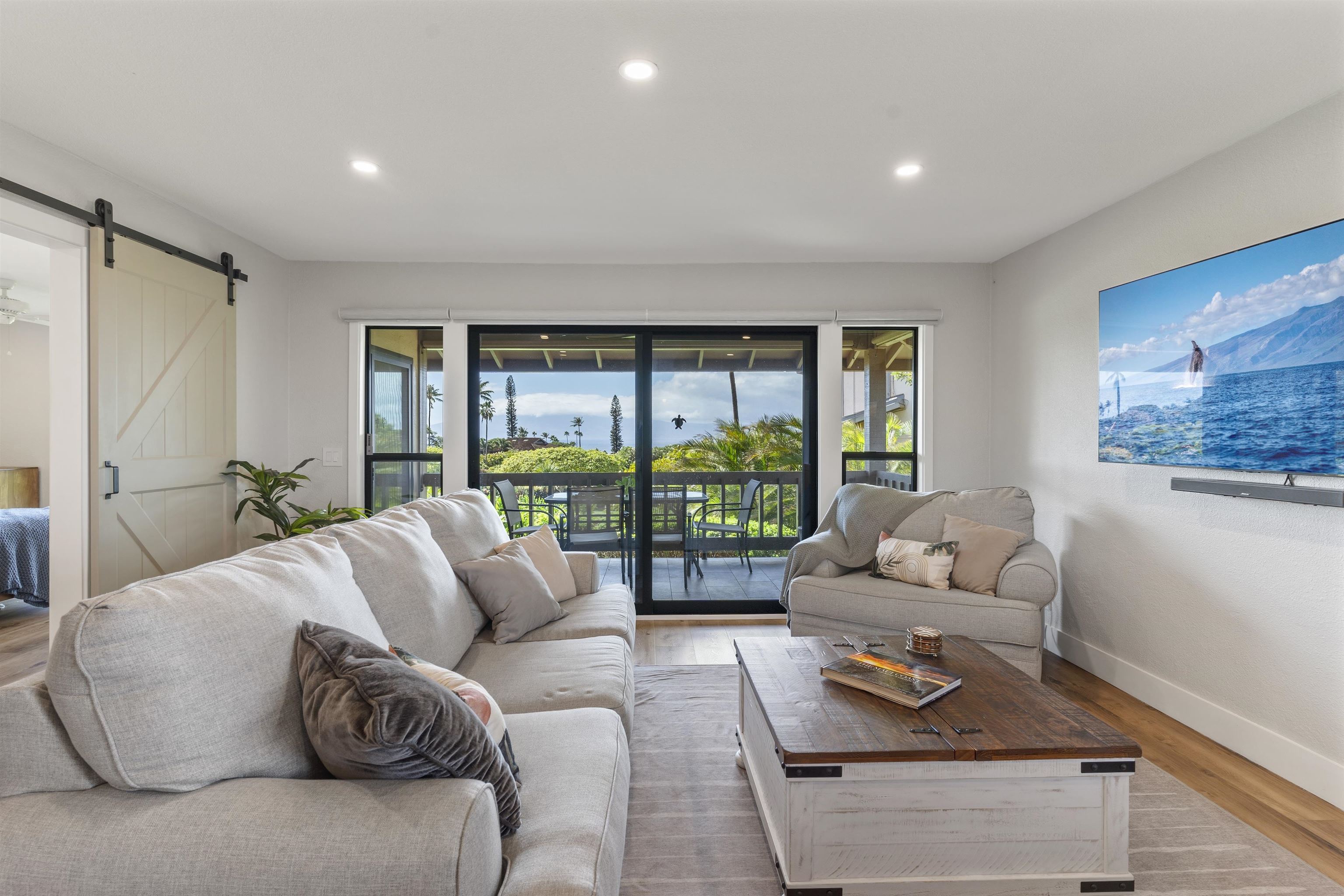 150 Puukolii Road, Unit 43 Lahaina, HI 96761 - Photo 13 of 31 a living room with furniture and a large window