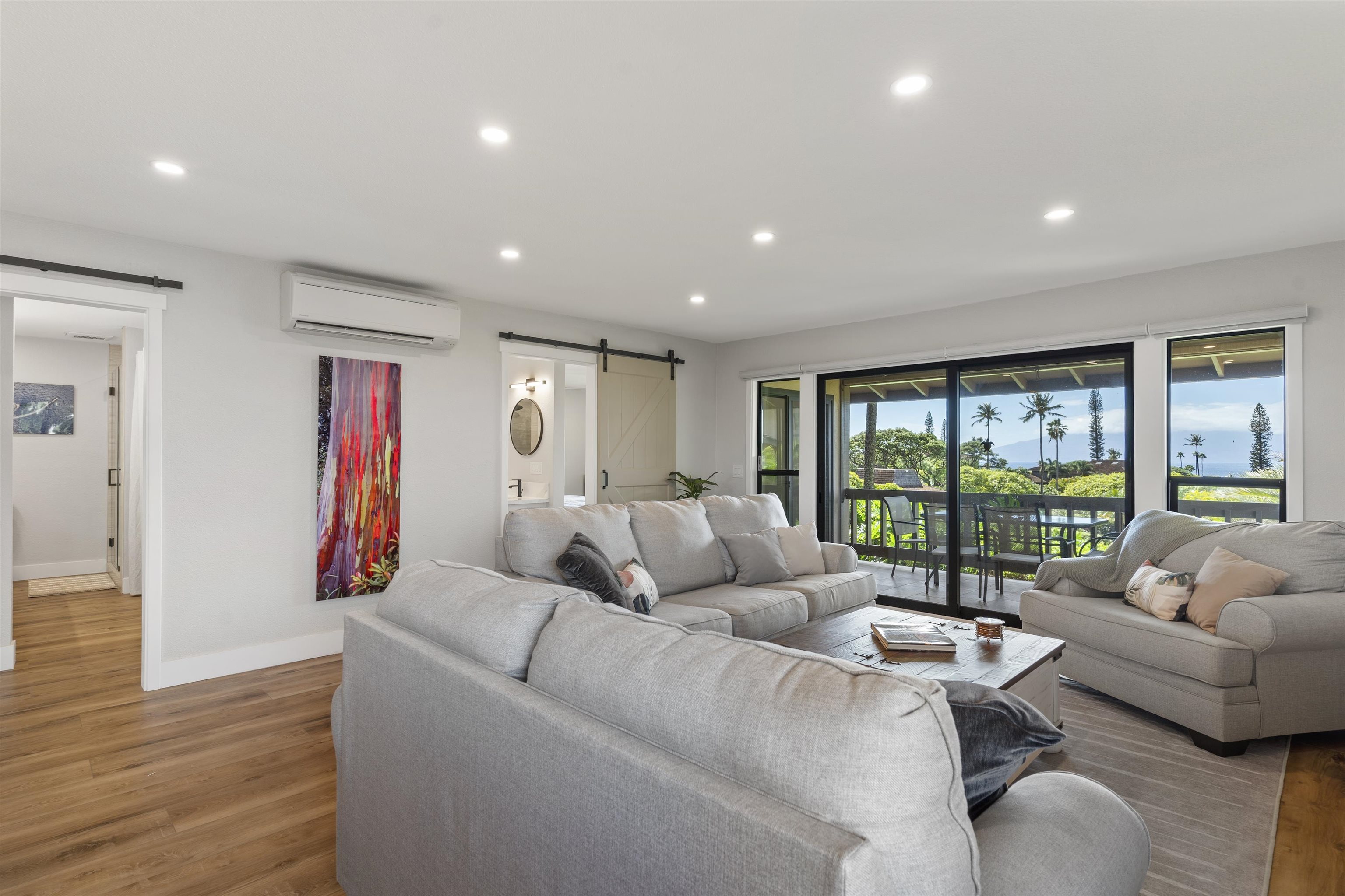 150 Puukolii Road, Unit 43 Lahaina, HI 96761 - Photo 14 of 31 a living room with furniture and a large window