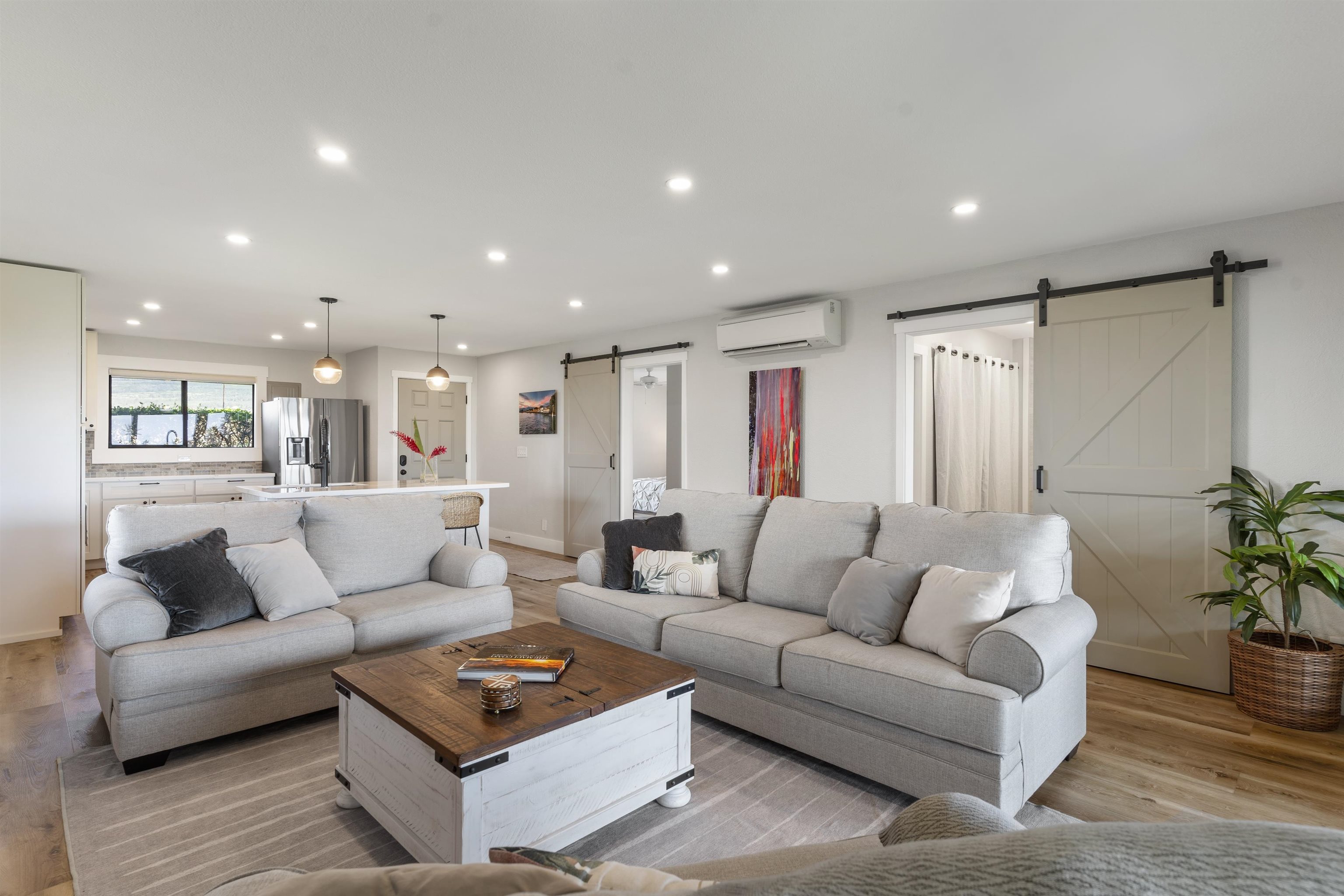 150 Puukolii Road, Unit 43 Lahaina, HI 96761 - Photo 2 of 31 a living room with furniture and a couch