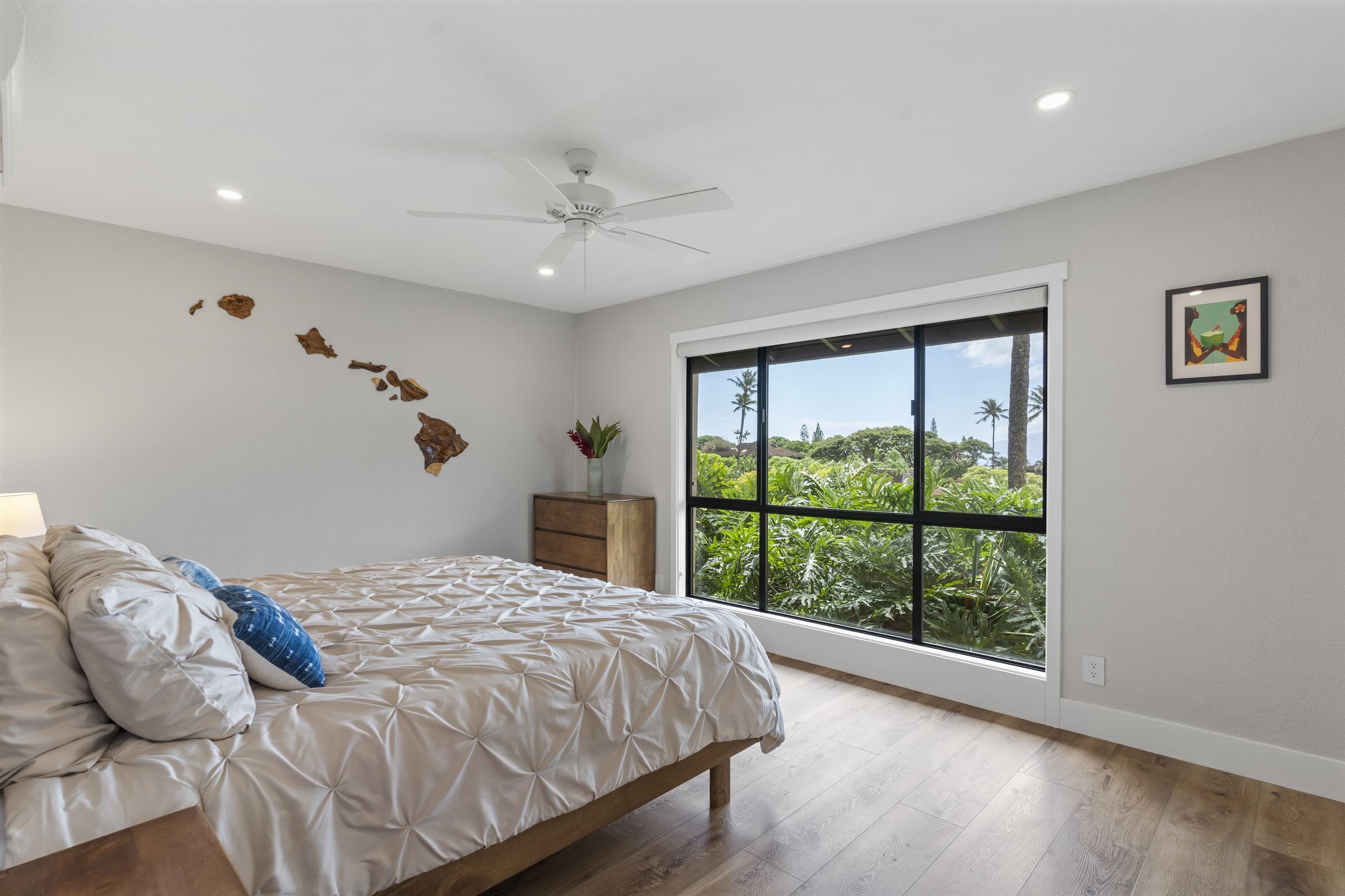 150 Puukolii Road, Unit 43 Lahaina, HI 96761 - Photo 23 of 31 a bedroom with a large bed and a window