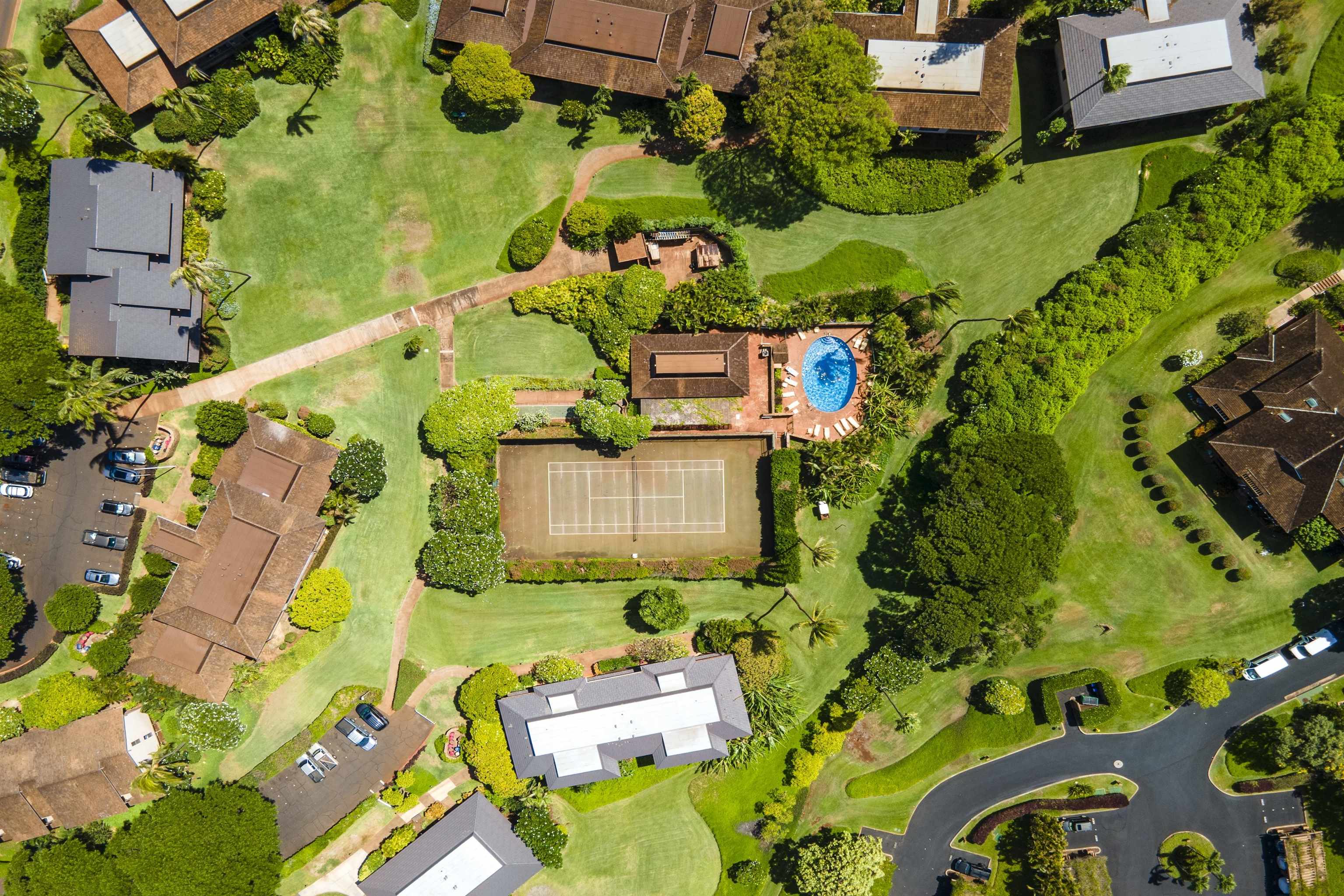 150 Puukolii Road, Unit 43 Lahaina, HI 96761 - Photo 9 of 31 an aerial view of a swimming pool with a yard