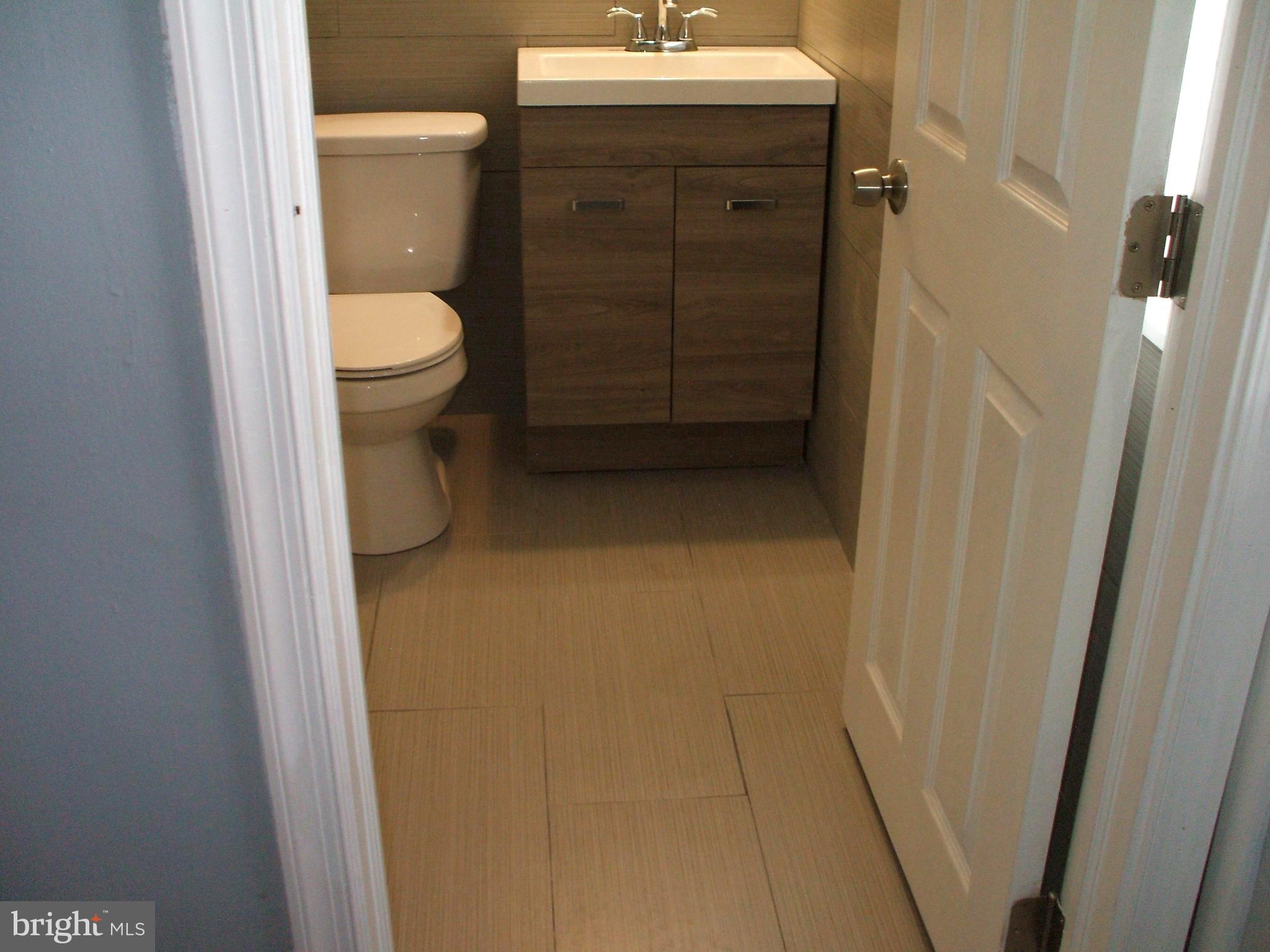 2749 Bethel Road Chester, PA 19013 - Photo 13 of 20 New Bathroom Fixtures & New Ceramic Tile Floor