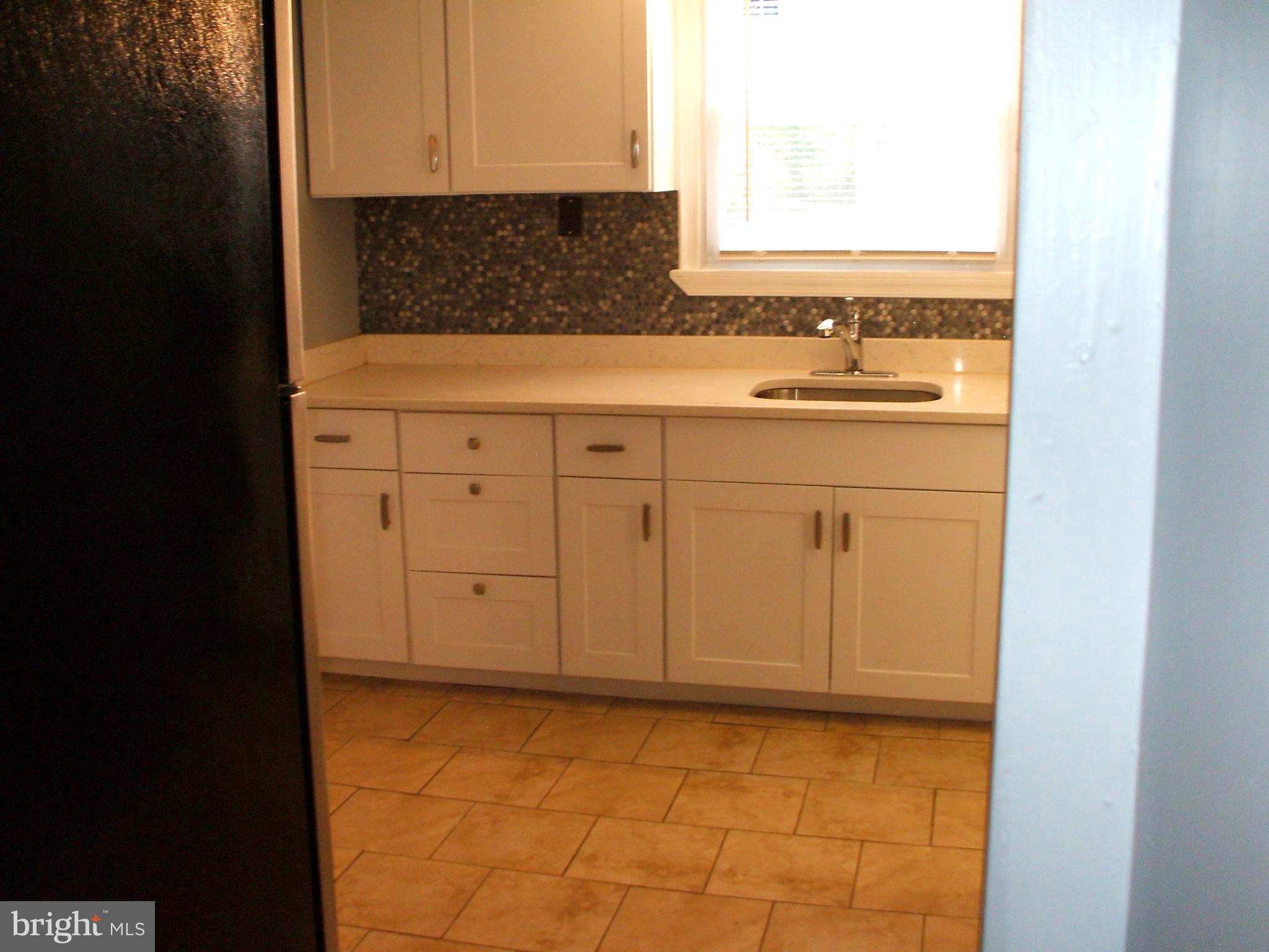2749 Bethel Road Chester, PA 19013 - Photo 3 of 20 Ceramic Tile Floor & Backsplash