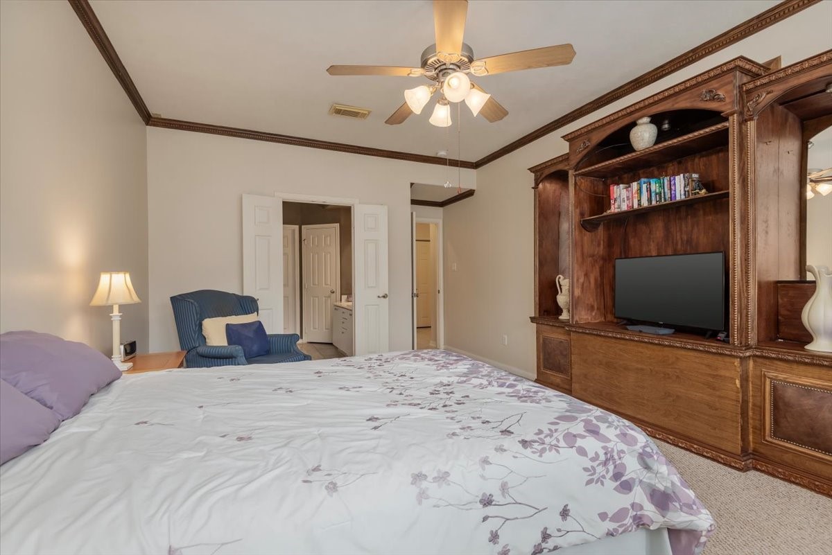 2919 Crescent Star Road Spring, TX 77388 - Photo 17 of 39 Primary bedroom. notice the crwon molding detail.