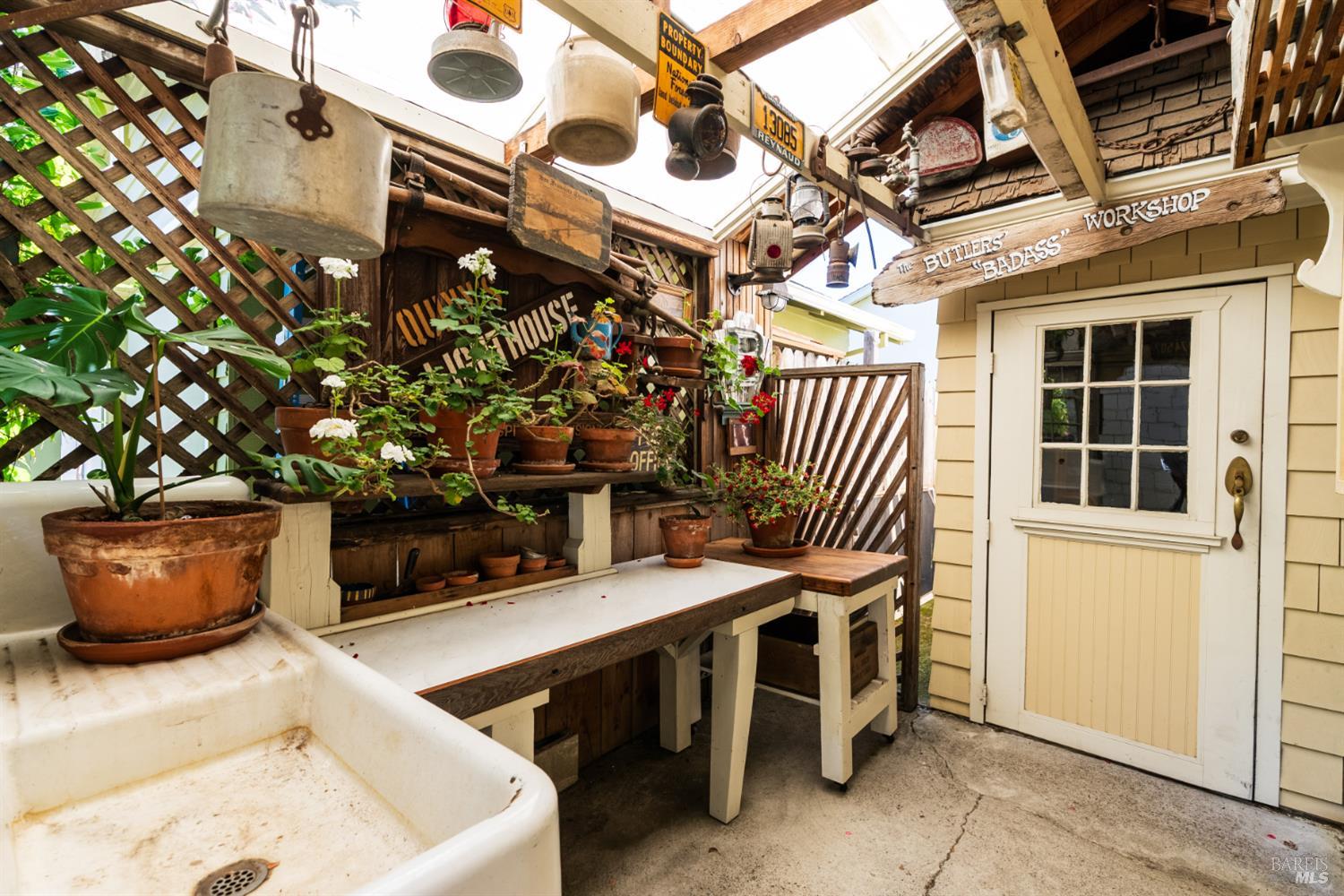 931 Humboldt Street Santa Rosa, CA 95404 - Photo 48 of 61 A covered area for potting provides an enchanting entrance to 1 car garage.