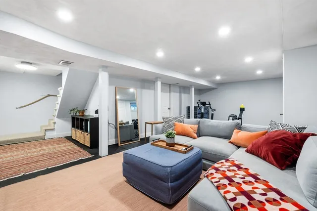 a living room with furniture and a couch