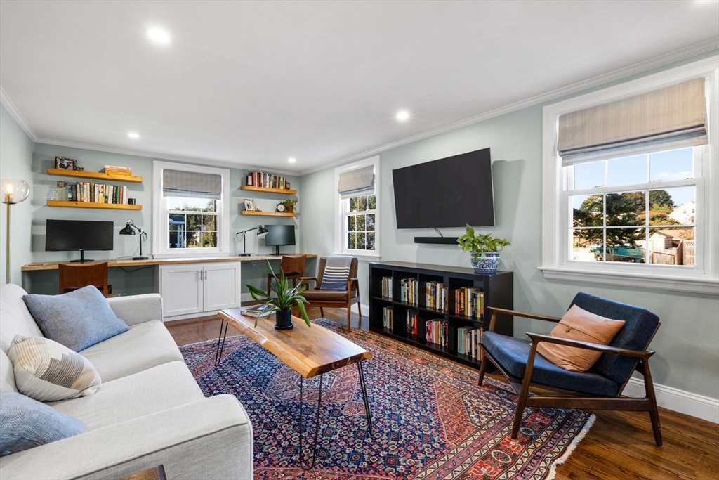13 Parsons Drive Beverly, MA 01915 - Photo 7 of 31 a living room with furniture and a flat screen tv