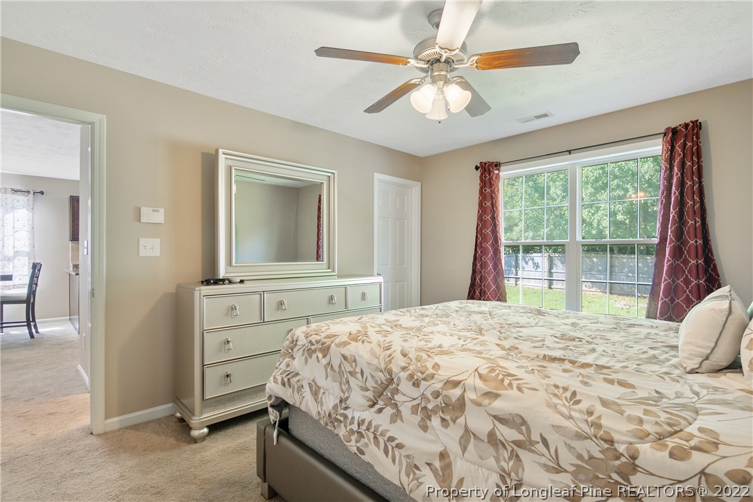 314 Cape Fear Road Raeford, NC 28376 - Photo 26 of 50 a bedroom with a large bed and a window