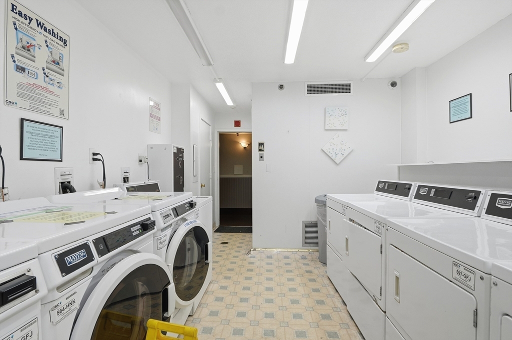 70 Southbridge Street, Unit 310 Worcester, MA 01608 - Photo 15 of 28 a utility room with dryer and washer