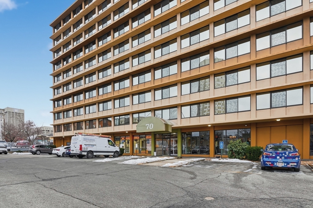 70 Southbridge Street, Unit 310 Worcester, MA 01608 - Photo 2 of 28 a front view of a building with parked