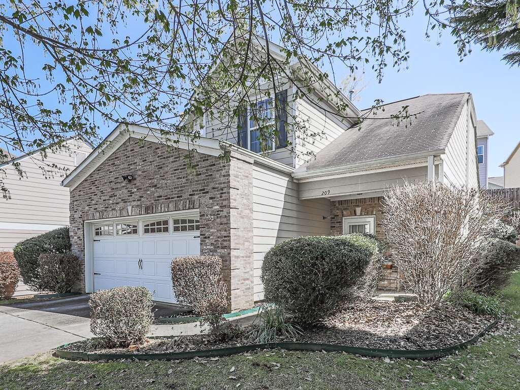 209 Cole Court Canton, GA 30114 - Photo 1 of 1 a view of a house with a yard