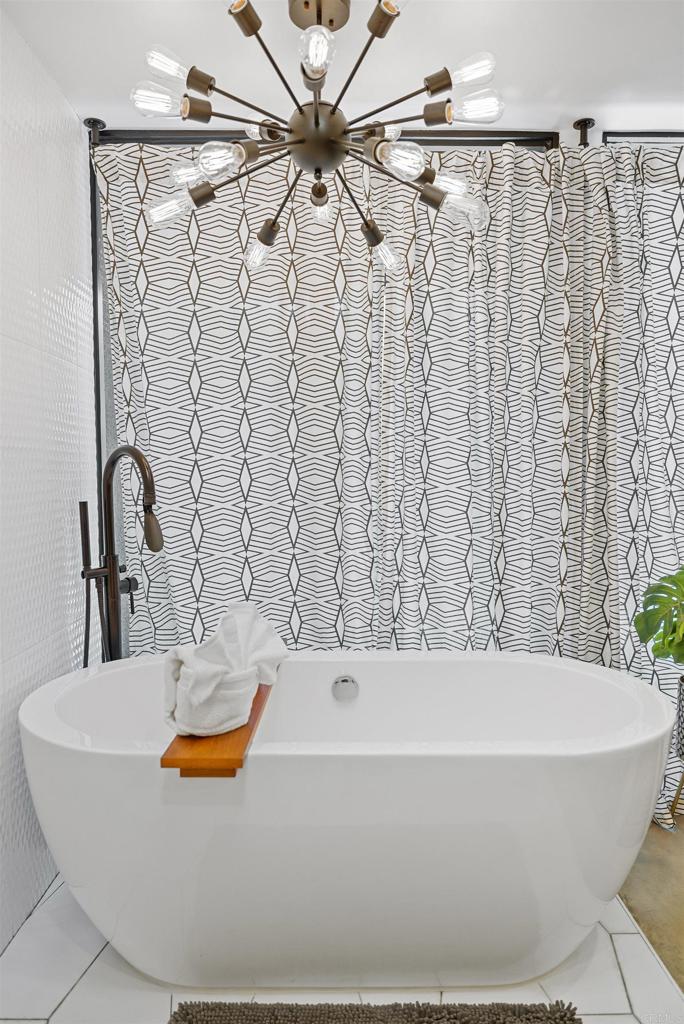 754 El Rancho Drive El Cajon, CA 92019 - Photo 20 of 55 a bathroom with a bathtub and shower