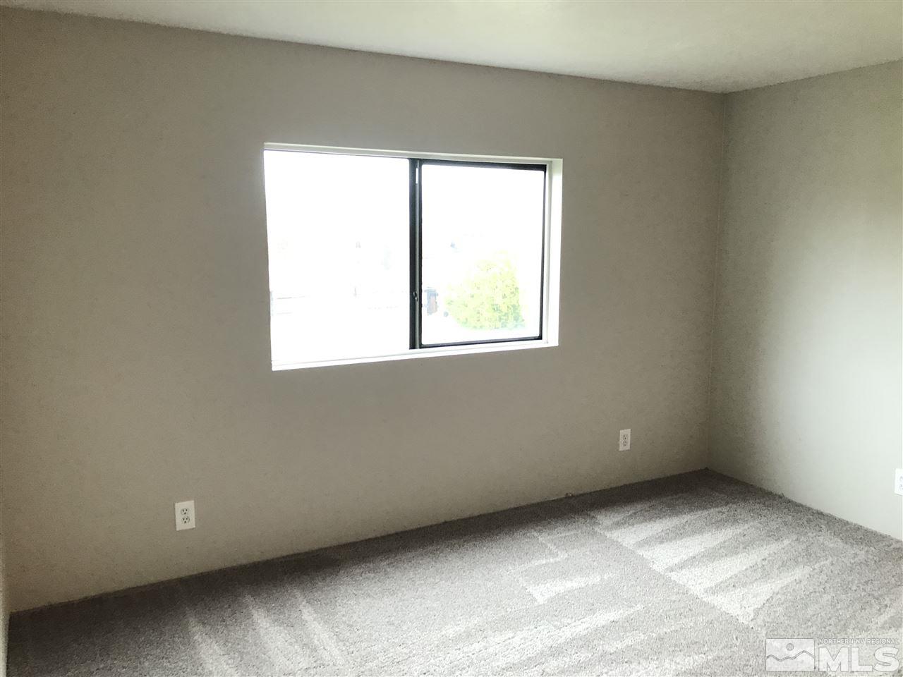 17400 Whippoorwill Lane Reno, NV 89508 - Photo 15 of 18 an empty room with a window