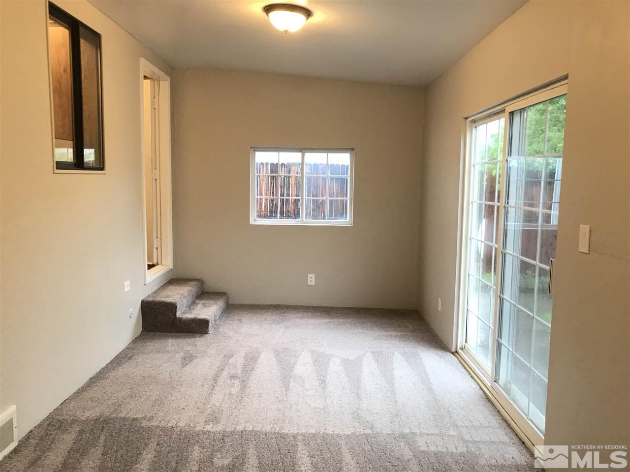 17400 Whippoorwill Lane Reno, NV 89508 - Photo 8 of 18 a view of an empty room and window